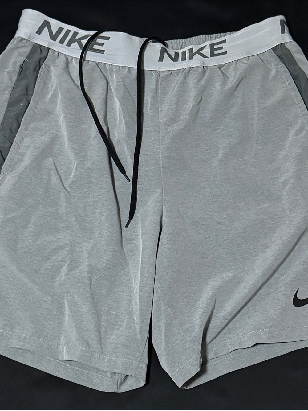 Nike Men’s Light Gray Athletic Shorts with Black Drawstring